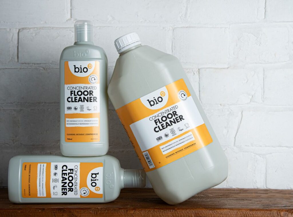 Three bottles of Bio-D concentrated floor cleaner stacked against each other. 