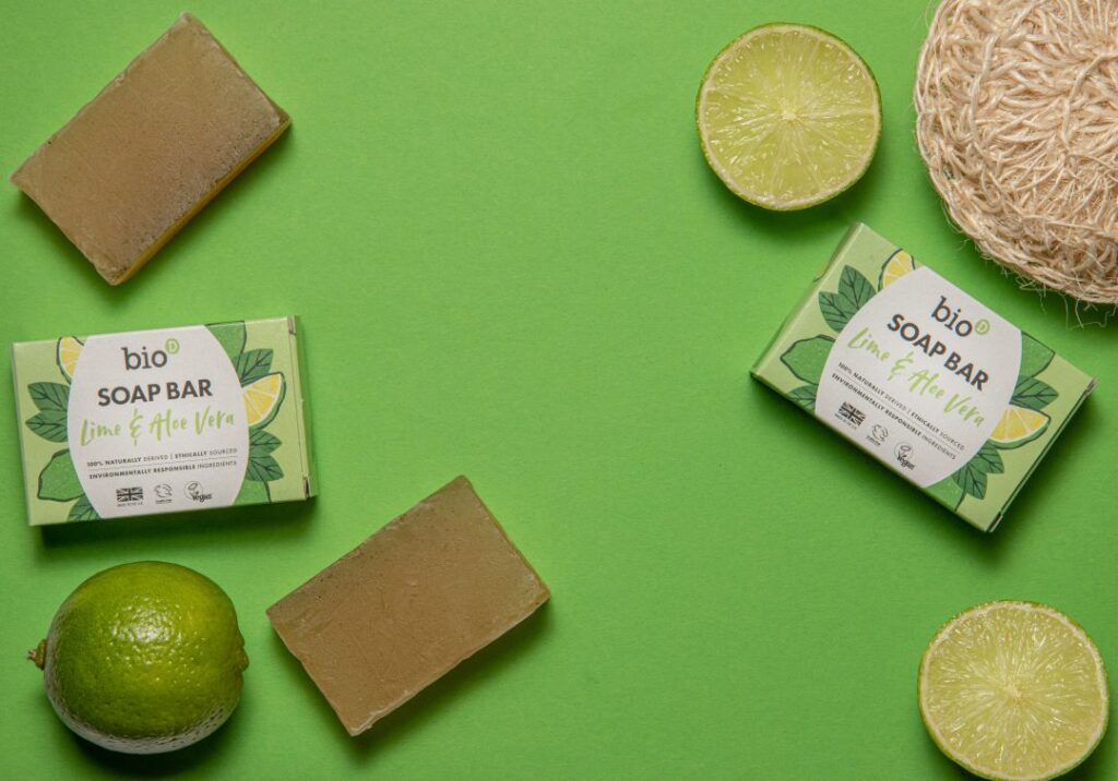 Bio-D lime and aloe vera soap bars against a bright green background