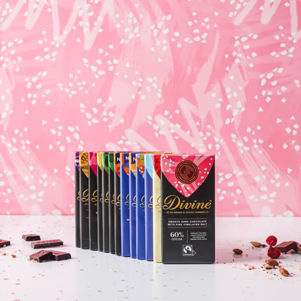 Full range of Divine chocolate bars stood in a line