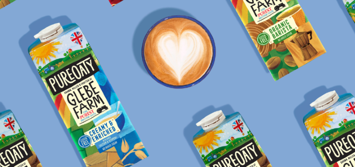 Birds eye view of some Glebe Farm cartons alongside a coffee