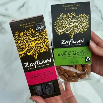 A packet of Zaytoun almonds and a packet of Zaytoun dates