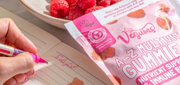 A partial close up of Vegums Vegan Sugar Free A-Z Gummies Bag