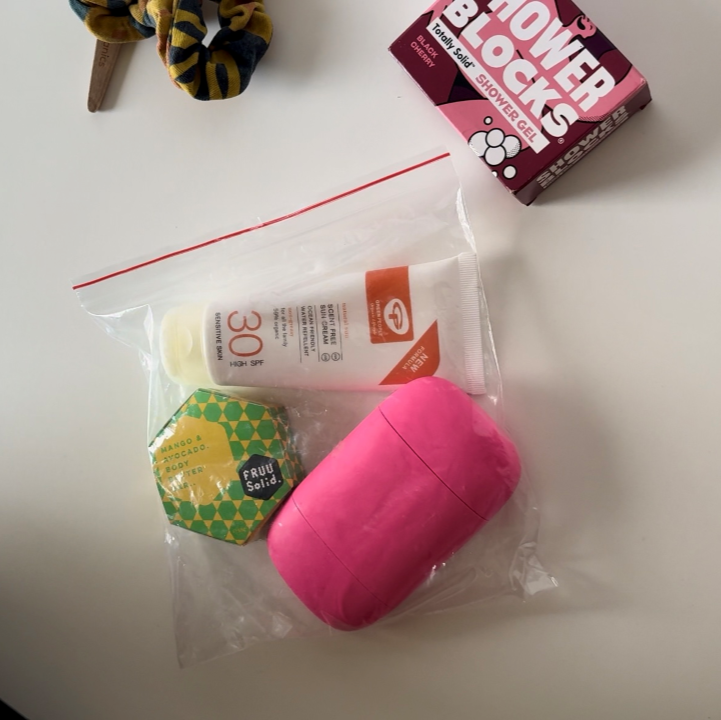 A hand items plane bag next to a soap bar