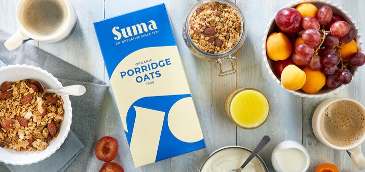 Suma Organic porridge oats on a table with other breakfast items